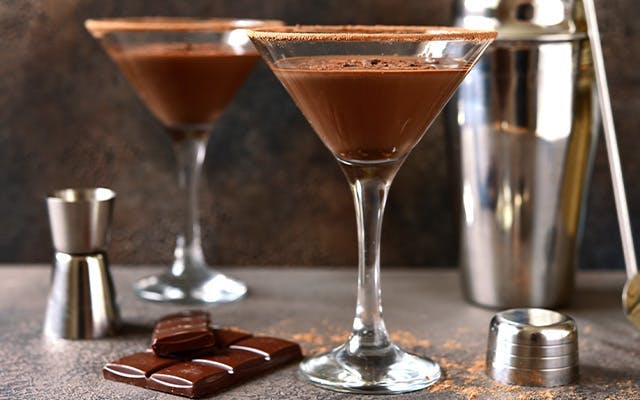 Nutella Martini cocktail recipe for dessert in a martini glass with a chocolate rim