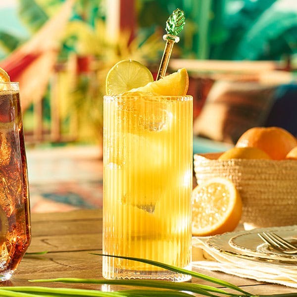 The perfect Don Q Oak Barrel Spiced Rum cocktail recipe with orangeade and citrus fruit