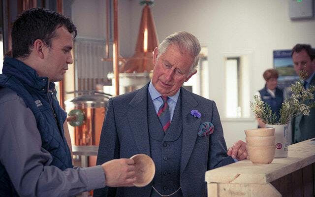 Prince Charles being given the tour