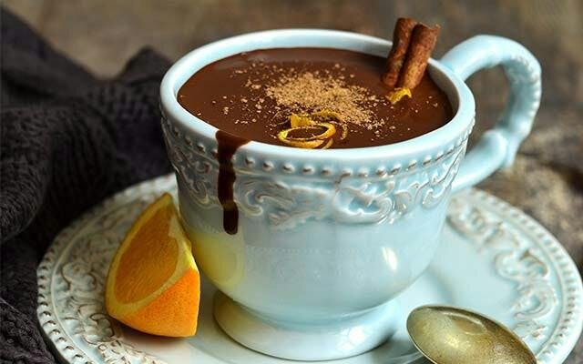 Hot chocolate with homemade chocolate orange liqueur is a decadent winter treat!