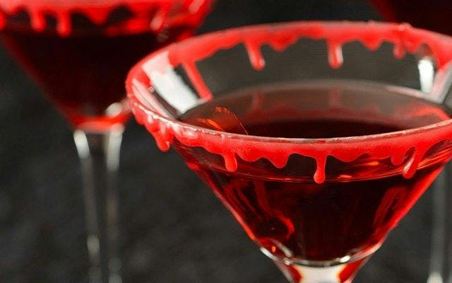 Red icing blood Halloween cocktail garnish idea