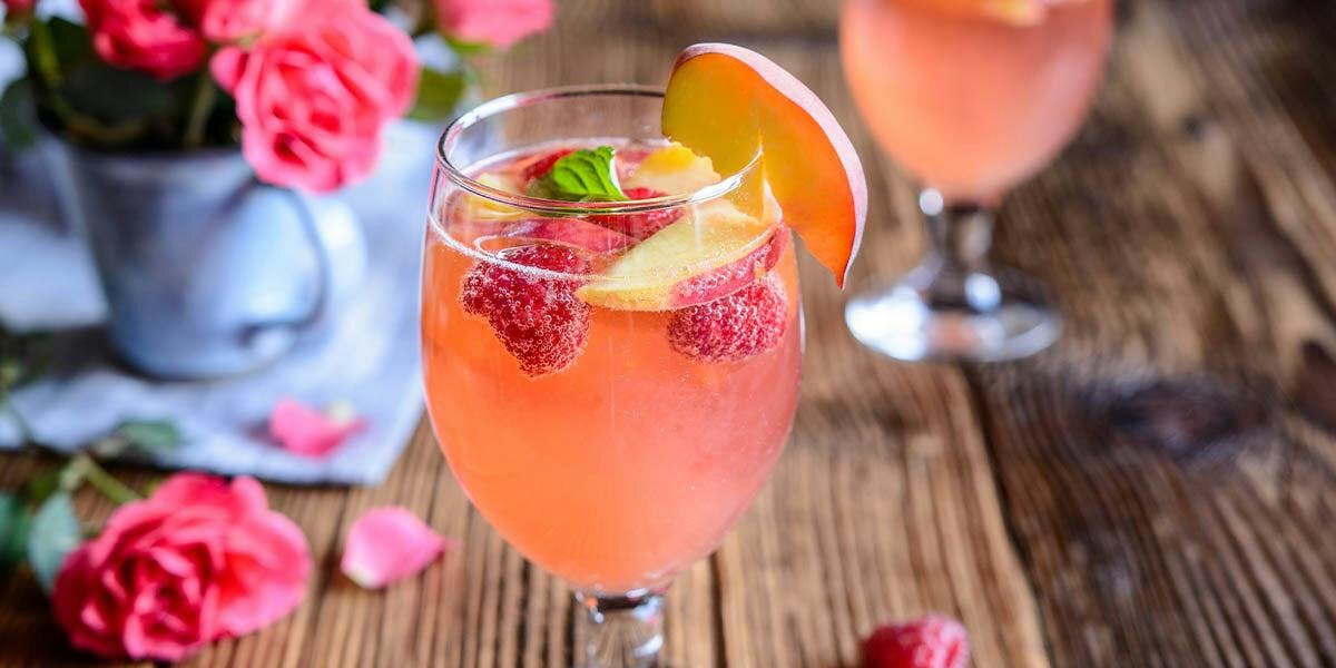 This Peach & Raspberry Gin Mimosa is the perfect cocktail for Mother's Day!