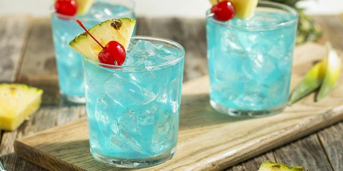 Gin and Blue Curaçao come together in this gorgeous blue cocktail recipe!