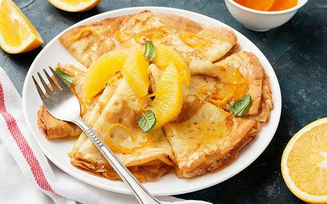 Pancakes with orange and lemon syrup