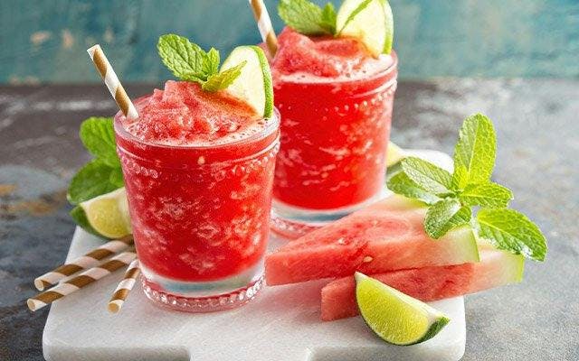 Frozen Watermelon Cocktail with Lime garnish