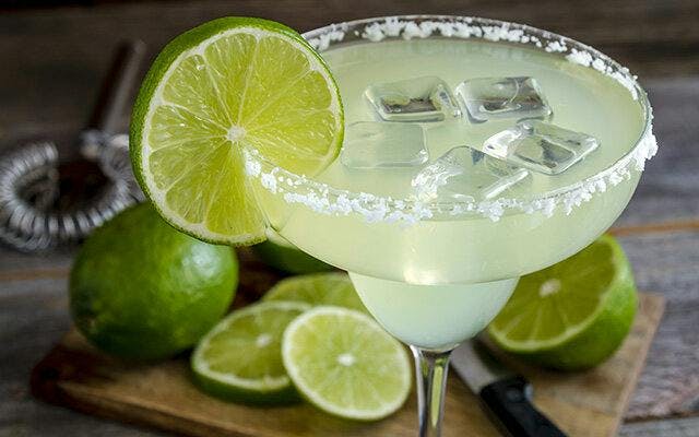Cocktail with lime and salt rim