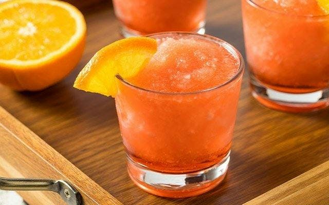 Frozen orange negroni cocktail