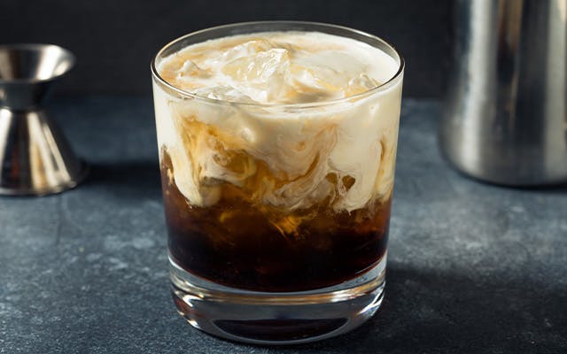 White Russian cocktail with ice in a Rocks glass