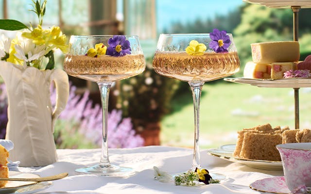 Spring cocktail called Cloud Nine, made with Sky Wave White Horse London Dry Gin and garnished with edible flowers