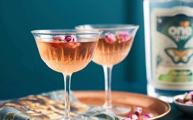 Rose petal garnish in cocktail