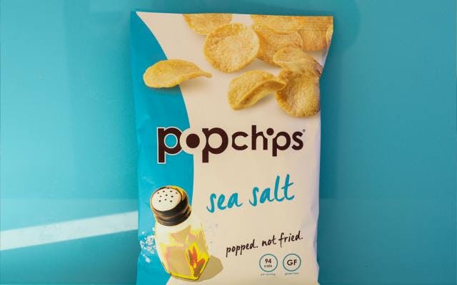 pop chips sea salted crisps blue background