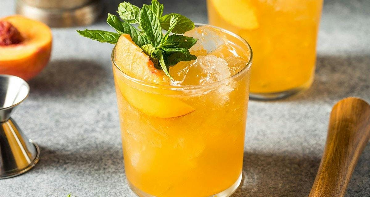 This Peach Gin Smash is exactly what we need right now to lift our spirits!