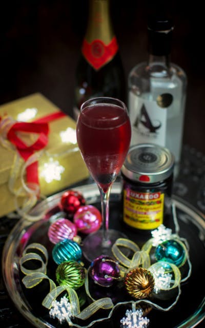 Modern art Arbikie cocktail with luxardo cherries and christmas accessories