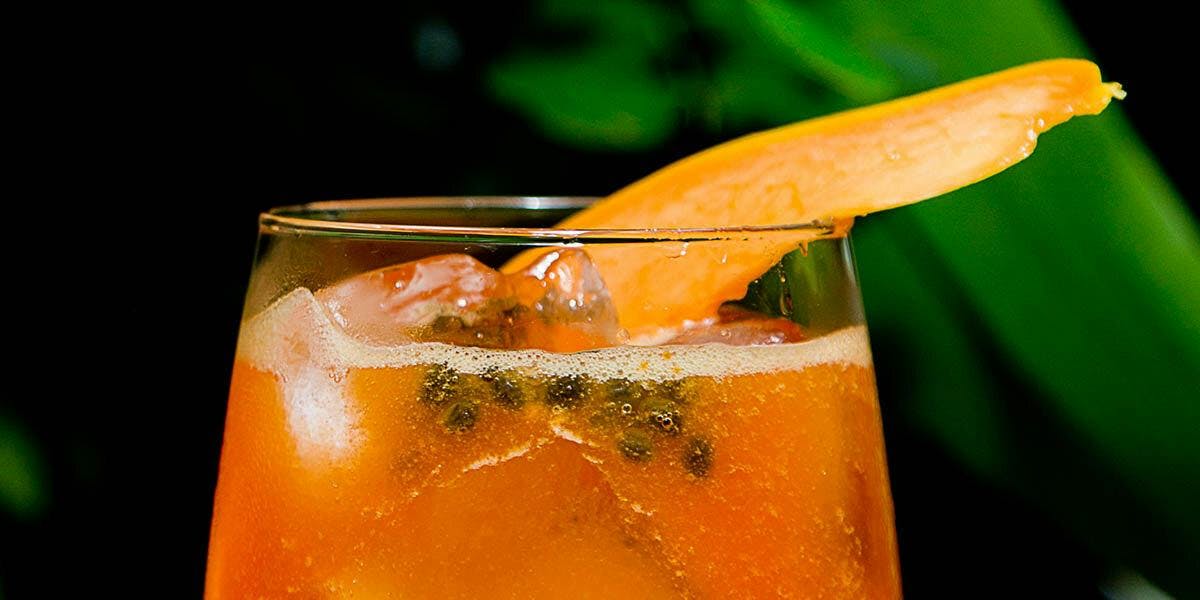 This Tropical Gin Spritz is a fruity cocktail that will transport you to beautiful shores of Brazil!