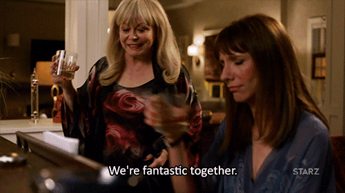 Women friends drinking together GIF.gif