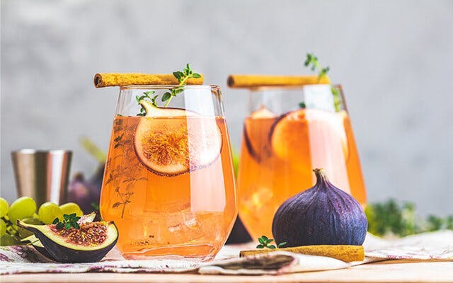 Fig Thyme and Honey Cocktail Cinnamon Garnish.jpg
