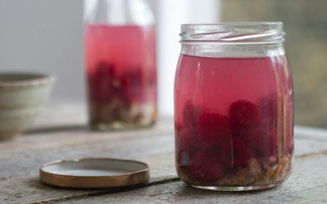 Raspberry infused gin in a jar