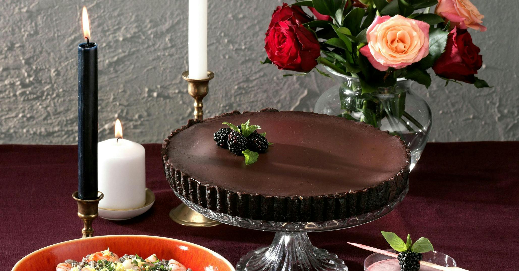 This decadent gin-spiked chocolate & blackberry tart is the dinner party dessert of our dreams!