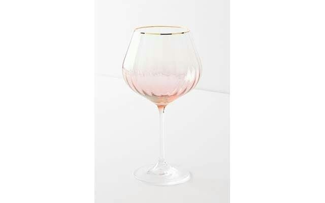 This fluted, gold-rimmed pink ombre gin glass from Anthropologie is also £14