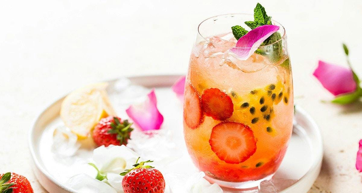 This Passion Fruit & Strawberry Gin cocktail is our favourite sunny tipple!