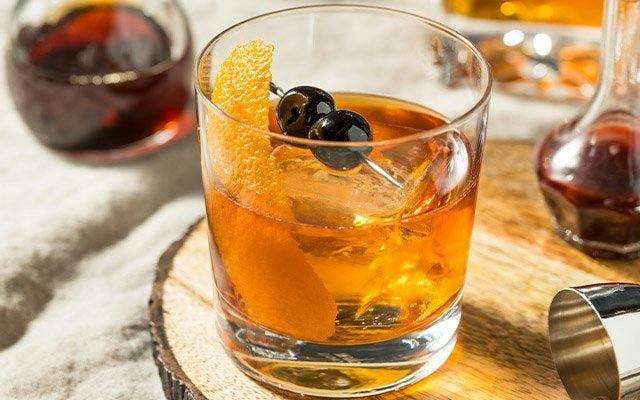 Old Fashioned whiskey cocktail with orange