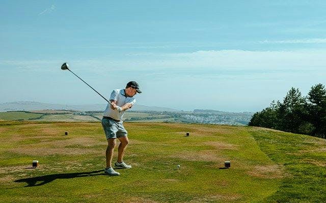 Playing golf at the Comis Hotel & Golf Resort