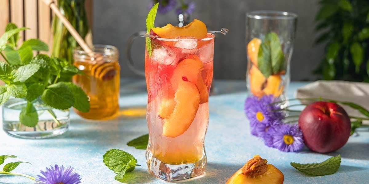 This two-ingredient peach and passionfruit gin cocktail recipe is not to be missed!