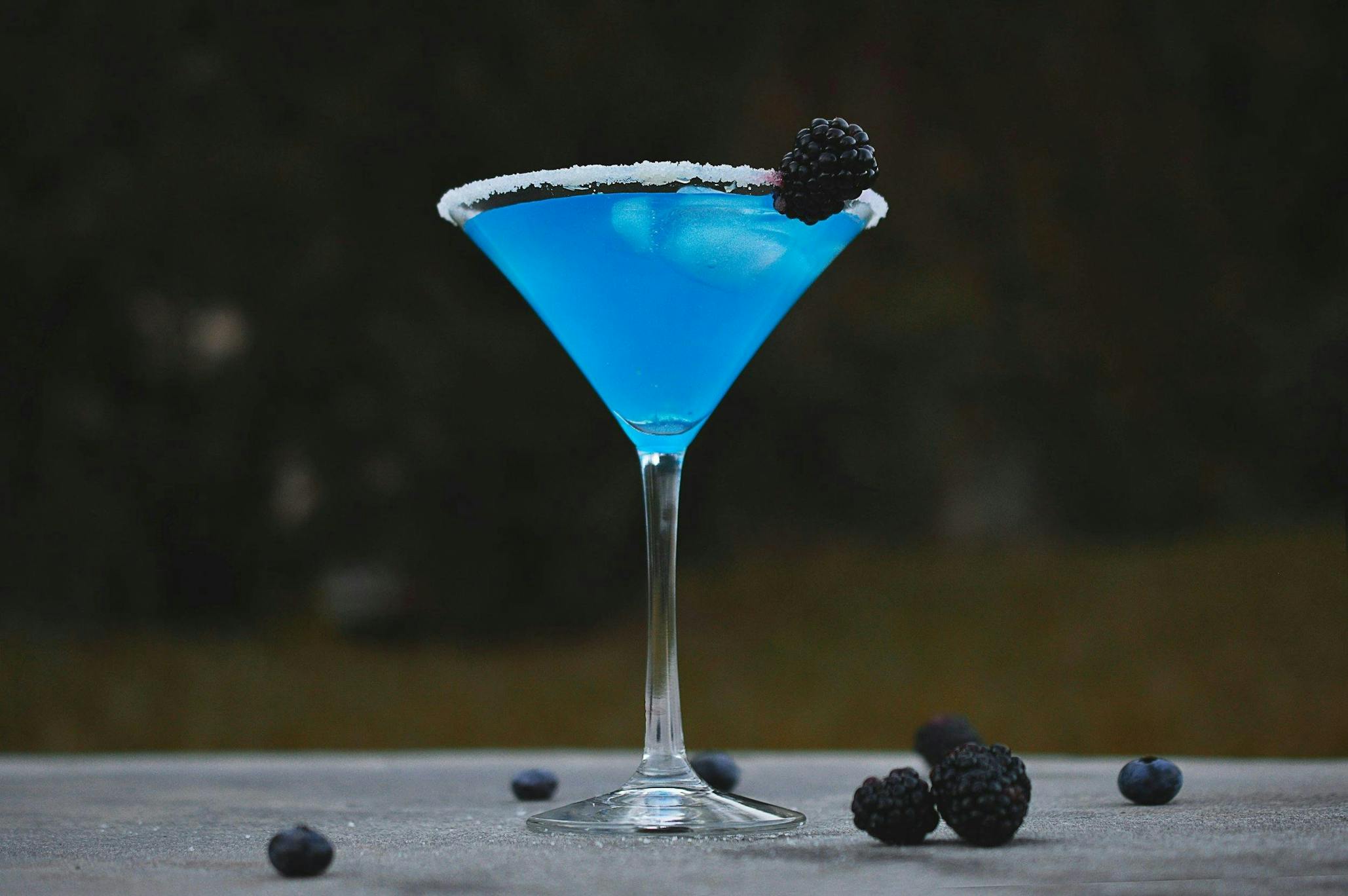 blue-cocktail-martini-glass-sugar-rim-blackberries-blueberries.jpg