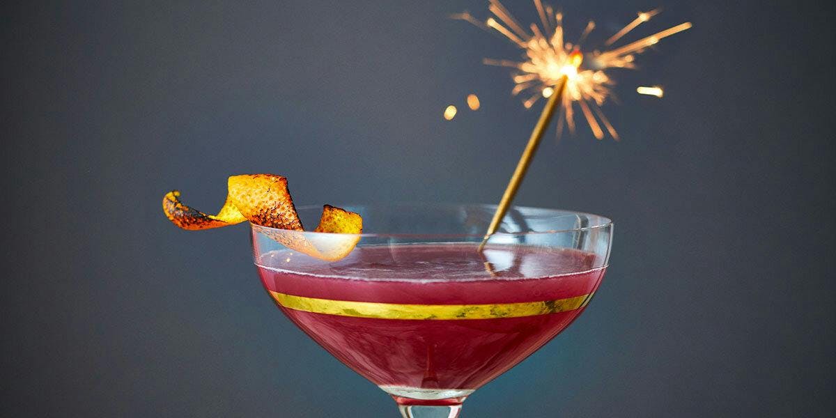 With a sparkler and flamed orange peel, this unique Bramble is perfect for Bonfire Night!