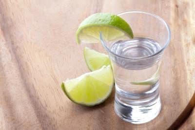 shot of gin with lime