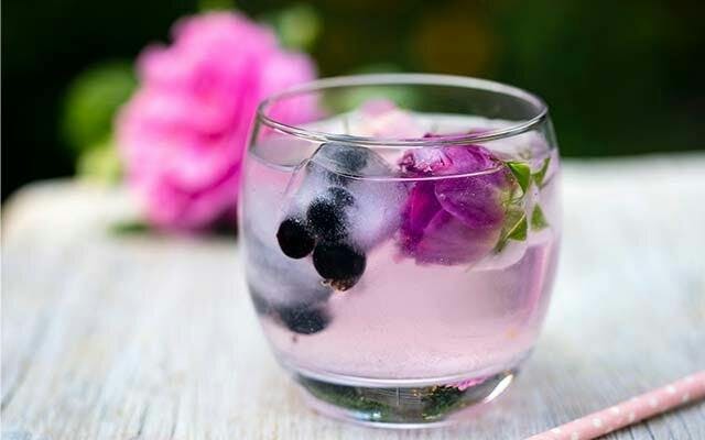 Flower ice cubes in cocktail.jpg