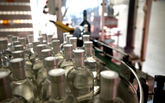 Lighthouse gin bottles on the production line at the distillery