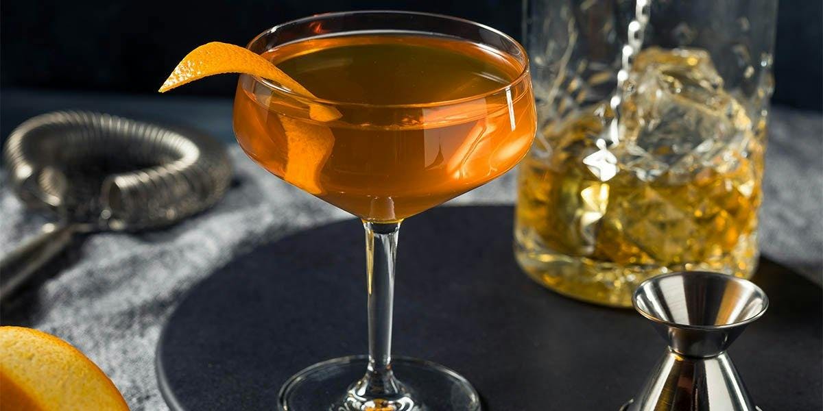We're mixing Earl Grey tea with Cointreau and gin for this stunning serve! 