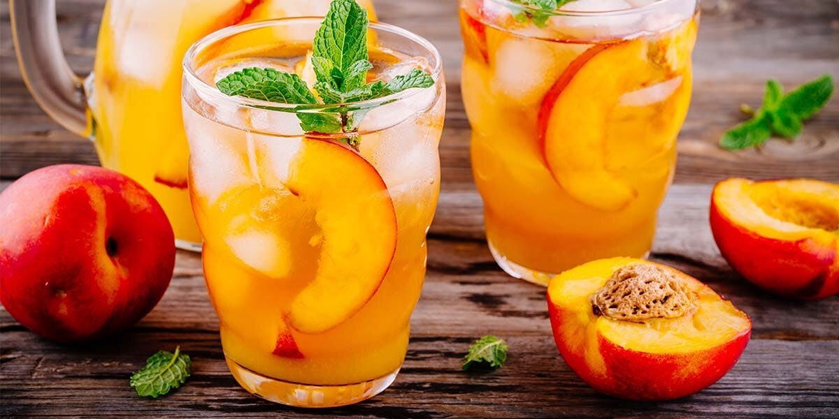 A quick and delicious gin and peach cocktail punch recipe for spring sipping