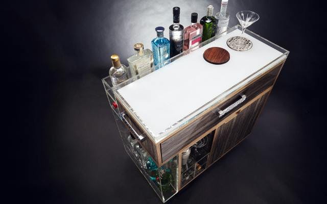 Quench Gin Trolley image with various gins and martini glass
