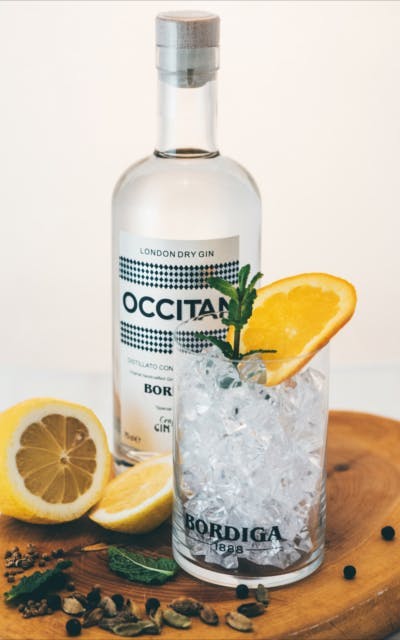 Occitan Gin bottle and ice tumbler