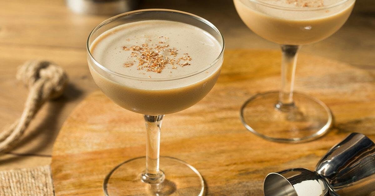 A creamy, hazelnut Praline Alexander sprinkled with biscoff is the ultimate indulgent cocktail!