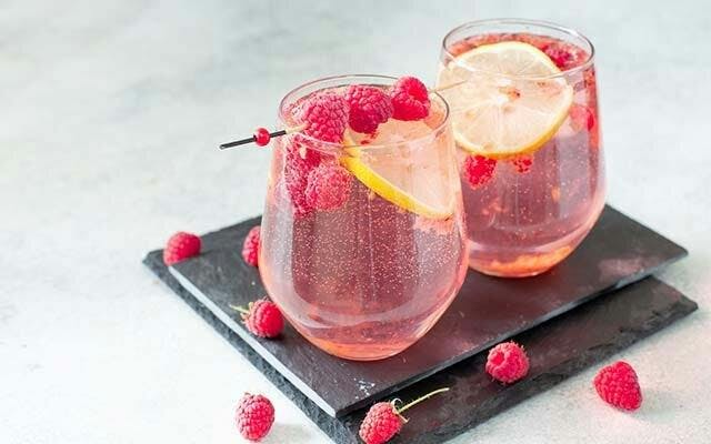 pink-gin-tonic-raspberry-lemon-garnish.jpg