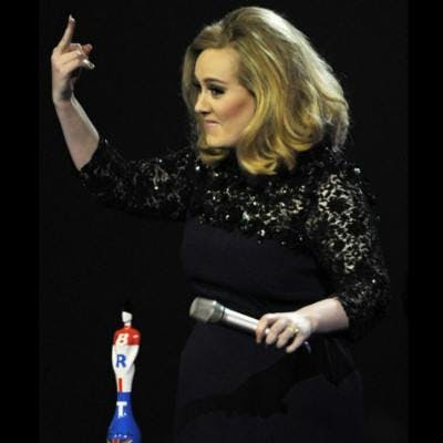Adele off screen finger swear brit awards speech