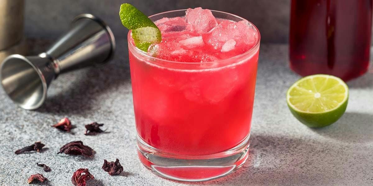 This bright red gin cocktail is made with hibiscus syrup and citrus juice and it is SO delicious!
