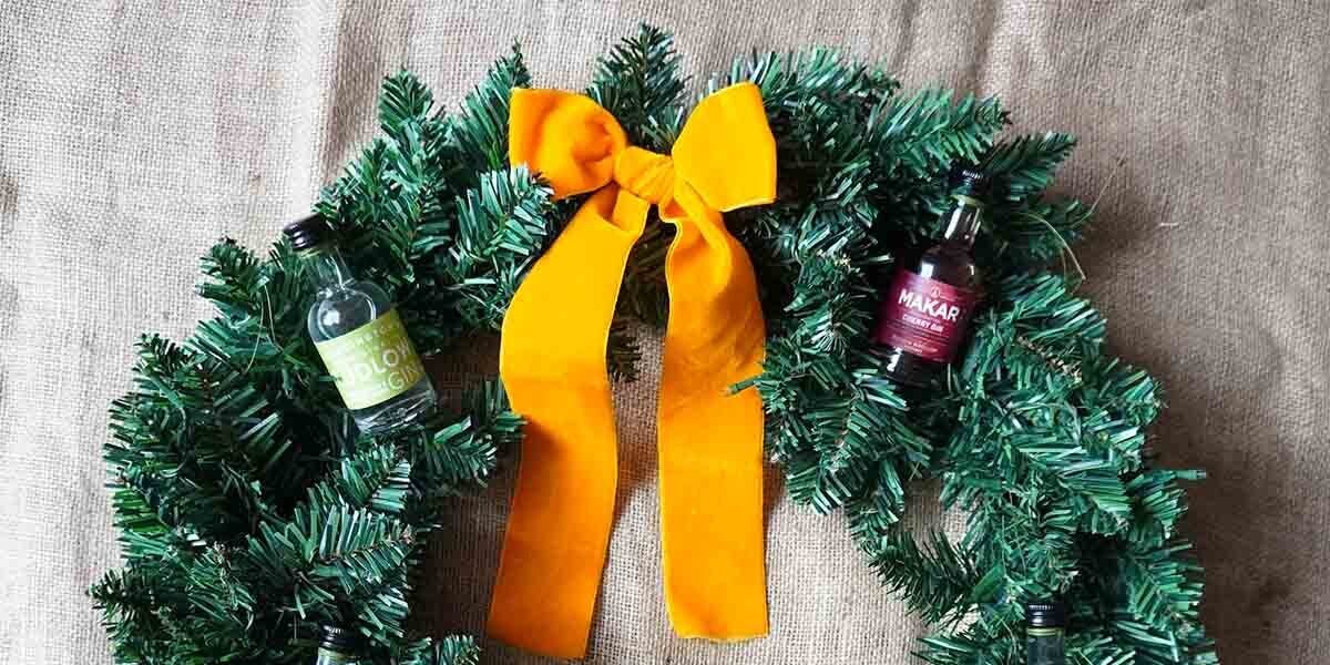 Make a Christmas wreath out of miniature gins! 