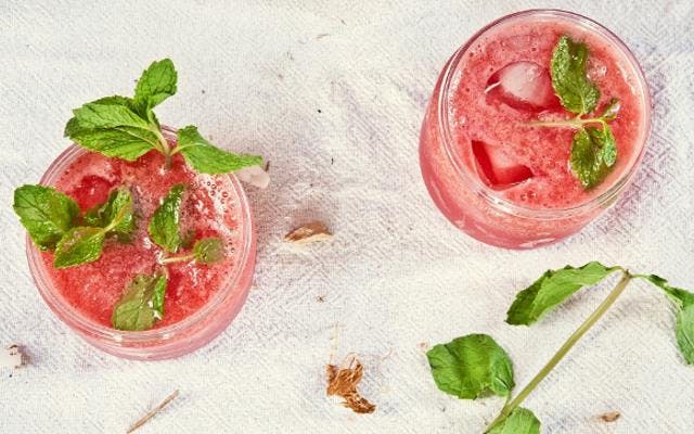 Pink Gin Cocktail with mint garnish