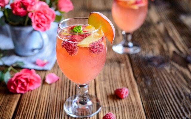 Raspberry and peach Mimosa cocktail recipe