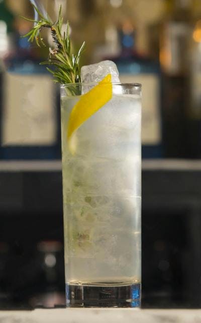 Rosemary and lemon garnish elderflower and rosemary gin collins cocktail