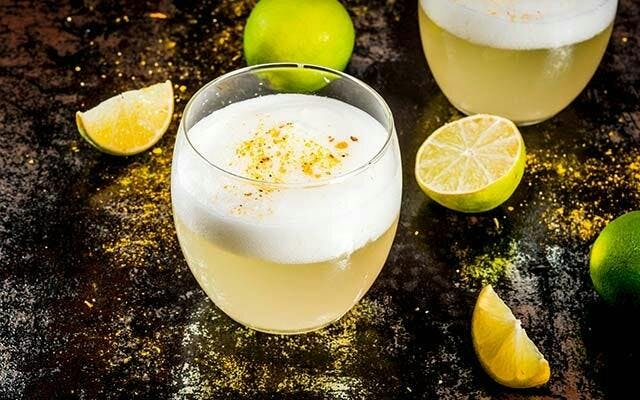 A vegan gin sour uses aquafaba in place of egg white for foam