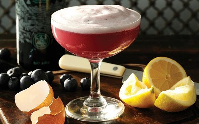 A blueberry gin sour is an easy-to-make but elegant cocktail