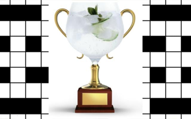 Crossword winner gin and tonic in copa glass trophy