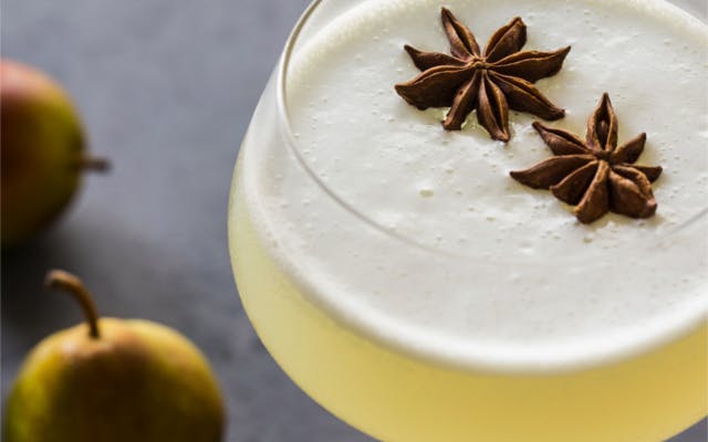 Spiced pear gin fizz cocktail