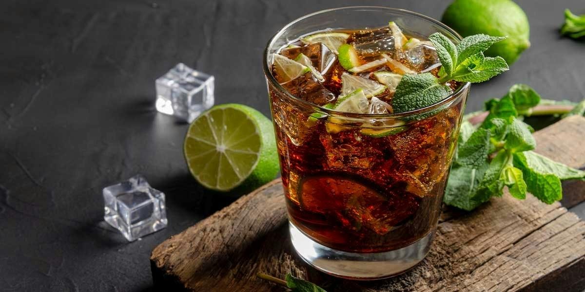 Coke Julep: made with coke, gin and mint liqueur, this creative cocktail is a must-try!