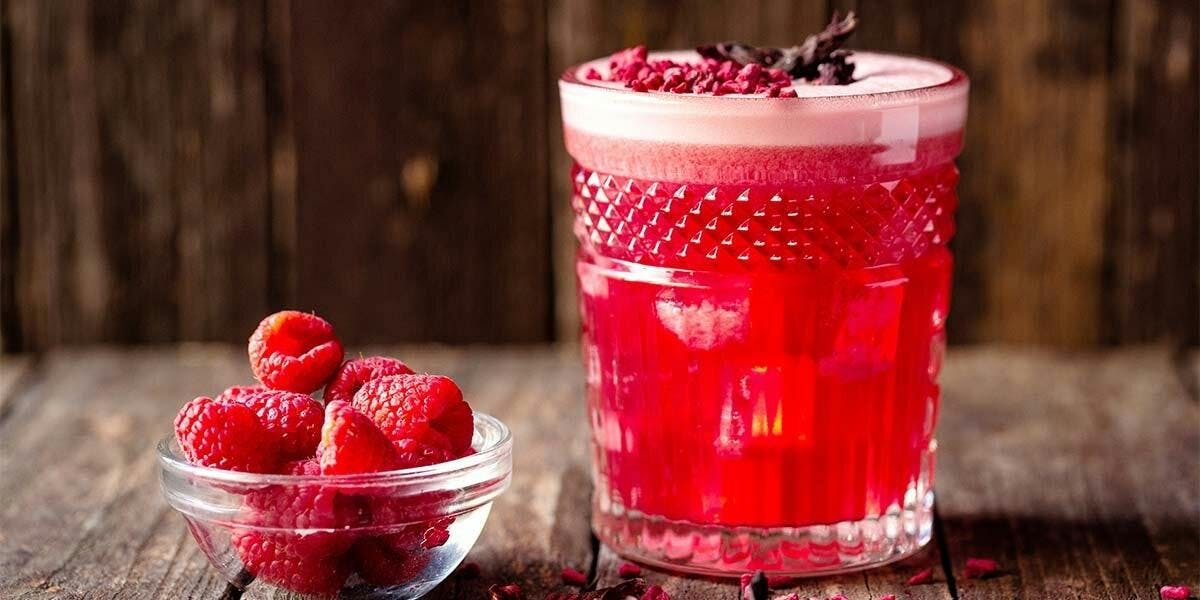 This pretty, pink Sour gin cocktail recipe is a Bakewell tart in a glass! 